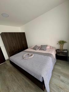 Una cama o camas en una habitación de Hospedaje Tena
