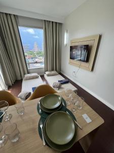 TV a/nebo společenská místnost v ubytování Flat hotel Mercure Manaus para até 6 pessoas + 21 fotografií