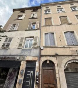 a tall building with windows and a door at Casa Terracotta 2 people -Central in Mâcon