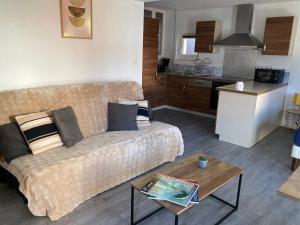 Kuchyň nebo kuchyňský kout v ubytování Appartement tout confort, avec terrasse