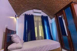 Postel nebo postele na pokoji v ubytování Nubian Spirit + 17 fotografií