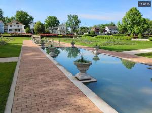 a row of water fountains in a park at Historic 1 Bdr across from Lakeside Park in Fort Wayne
