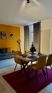 a living room with a table with a christmas tree on it at Best Stay Montreux in Montreux