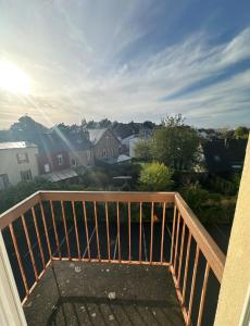 a balcony with a view of a city at Mon toit douillet in Saint-Brieuc