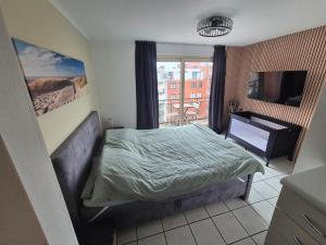 Postel nebo postele na pokoji v ubytování Ô Mistral Appartement