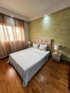 a bedroom with a large bed in a room at Morocco House in Casablanca +15 photos