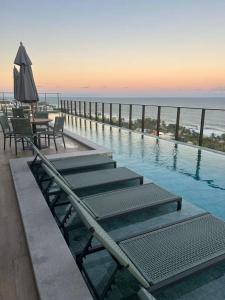 Πισίνα στο ή κοντά στο Recanto de Itapuã