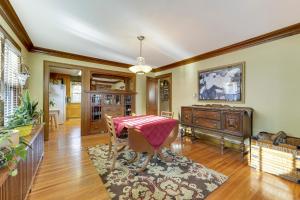 a living room with a table and a dining room at Minneapolis - Blaisdell Avenue in Minneapolis