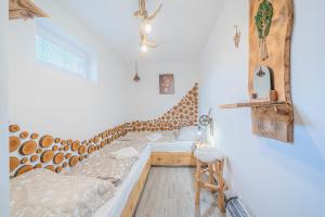 Postel nebo postele na pokoji v ubytování Apartmány Apollo Šírava + 40 fotografií