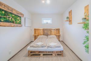 Postel nebo postele na pokoji v ubytování Apartmány Apollo Šírava