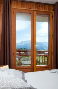 Nespecifikovaný výhled na hory nebo výhled na hory při pohledu z bed and breakfast