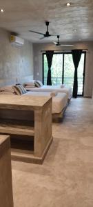 Ένα ή περισσότερα κρεβάτια σε δωμάτιο στο CASA SOLFE siete nueve nueve