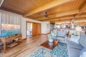 a living room with a couch and a table at Kahana Outrigger 3A2 · KHO 3A2 Updated OceanFront 3BD wPool AC O in Kahana