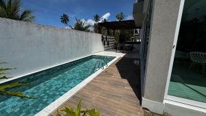 Swimmingpoolen hos eller tæt på Casa Estrela do Mar