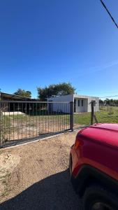 Casitas Atlántida في أتلانتيدا: حاجز امام مبنى به مبنى +94 صورة