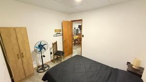 Postel nebo postele na pokoji v ubytování Casitas Atlántida