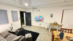 TV a/nebo společenská místnost v ubytování Casitas Atlántida