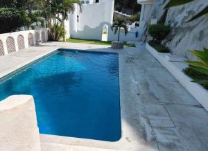 Bazén v ubytování Manzanillo Ocean View Apartment Las Hadas Peninsula nebo v jeho okolí