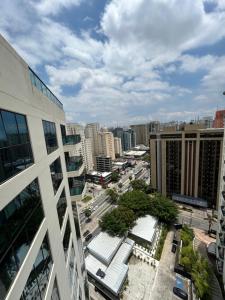 a view of a city from a building at Hotel Luxuoso Moema Shopping Ibirapuera 1806 in Sao Paulo