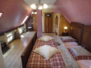 Postel nebo postele na pokoji v ubytování Gite Le Petit Moulin