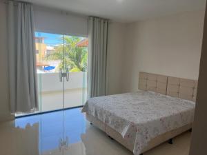 Postel nebo postele na pokoji v ubytování Casa 21 + 16 fotografií