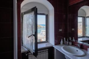 Koupelna v ubytování Luce sul Mare - Il Monastero Sul Mare + 27 fotografií