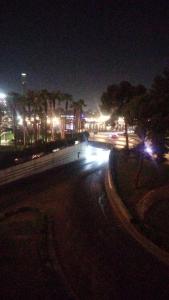 a city street lit up at night with street lights at Host-Gram Hotel & Suites Downtown in Cairo