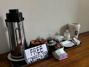Kaffe- og tefaciliteter på Suwardika Homestay & Dormitory + 33 billeder