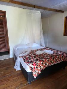 Postel nebo postele na pokoji v ubytování Baobao Hostel Palomino
