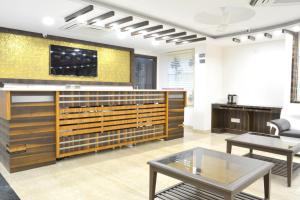 TV a/nebo společenská místnost v ubytování Hotel Tara Palace Redfort