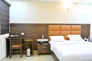 Postel nebo postele na pokoji v ubytování Hotel Tara Palace Redfort