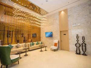 Μια τηλεόραση ή/και κέντρο ψυχαγωγίας στο City Comfort Inn Laibin Wuxuan Yuda