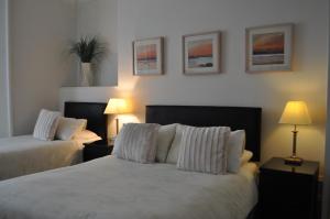 A bed or beds in a room at 3rd House 