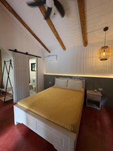 a bedroom with a large bed in a room at Cabañas Time Out in Santa Catalina