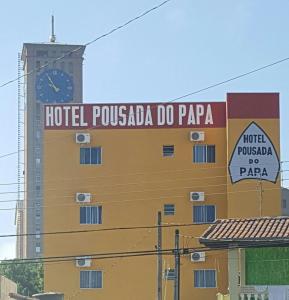 a hotel puebla do papa sign on a building at Hotel Pousada do Papa in Aparecida