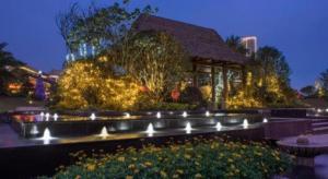 a garden with lights in front of a gazebo at Country Garden Phoenix Hotel Nanchong in Nanchong