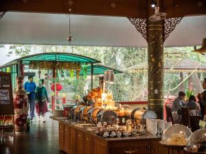 Un restaurant sau alt loc unde se poate mânca la Tao Garden Health Spa & Resort