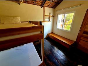 Postel nebo postele na pokoji v ubytování NATIVO D' KUBO