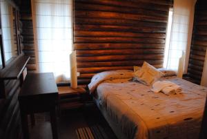 Lova arba lovos apgyvendinimo įstaigoje Pueblo Del Rio Mountain Lodge & Spa