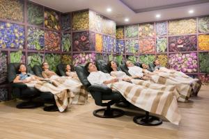 a group of people sitting in chairs in a room at Medical SPA "Eglės sanatorija" Birštonas in Birštonas +71 photos