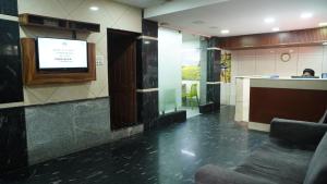 Ο χώρος του λόμπι ή της ρεσεψιόν στο Olive Green Hotel