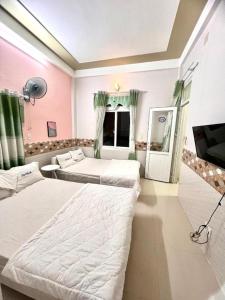 Televisyen dan/atau pusat hiburan di Loc Thinh Motel