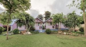 Κήπος έξω από το OYO 75308 Pea Najan Home Resort