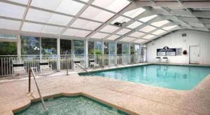 a large swimming pool with a large ceiling at Sea Trail Golf Resort & Convention Center in Sunset Beach