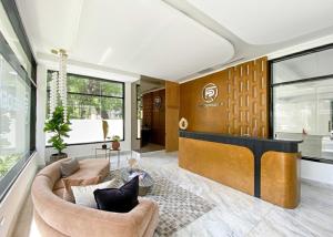 a living room with a couch and a table at ® {The~City~LUX~Place}@DowtownSD in La Julia