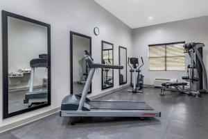 a gym with a treadmill and elliptical machines at Comfort Inn & Suites Cartersville - Emerson Lake Point in Cartersville