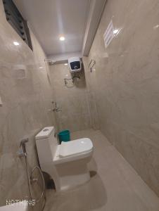 Koupelna v ubytování Oka Hotel