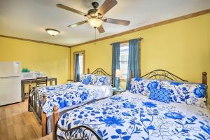 a bedroom with two beds and a ceiling fan at Family-Friendly Suite Autumn Midweek - 35 Off Promo! in Pleasant Mount +30 photos