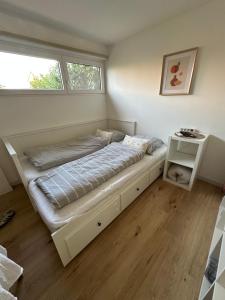 Postel nebo postele na pokoji v ubytování Au cœur de l Alsace