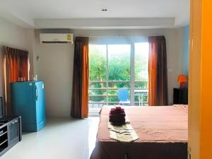 Katil atau katil-katil dalam bilik di Tontalay Hotel